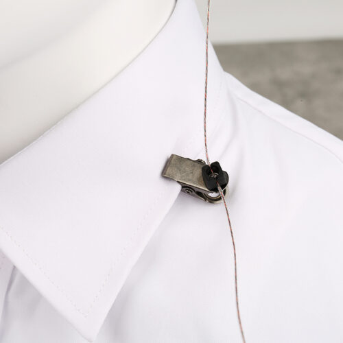 E 47 earpiece with 360 degree rotatable shirt clip securely attached to shirts, uniforms and vests, preventingthe earpiece from falling during running or chasing
