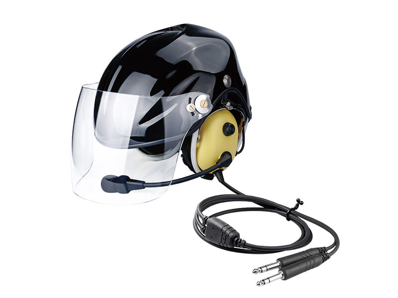 PH-HM100 aviation helmets with headsets, black over-ear communication headset with boom microphone, and padded headband.
