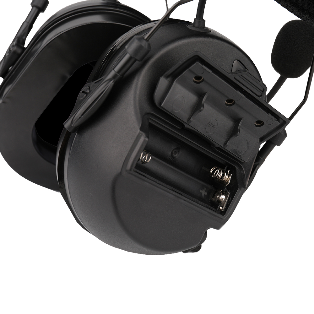 RE10 stealth black tactical headset showing open battery slot, no batteries inside