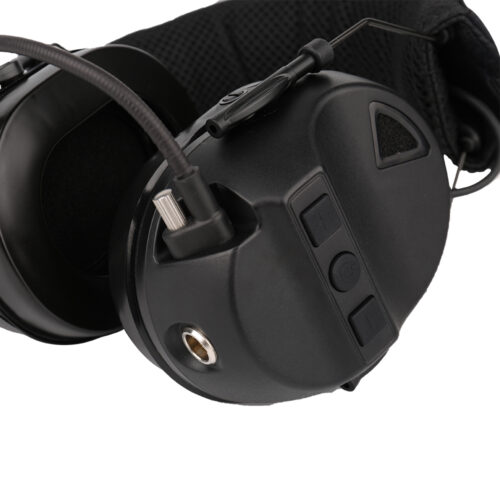 RE10 stealth black tactical headset showing volume and power controls with quick-disconnect port