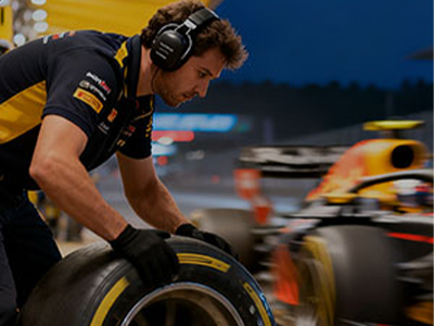 Racing communication system used in motorsports and pit crews for clear and reliable team coordination