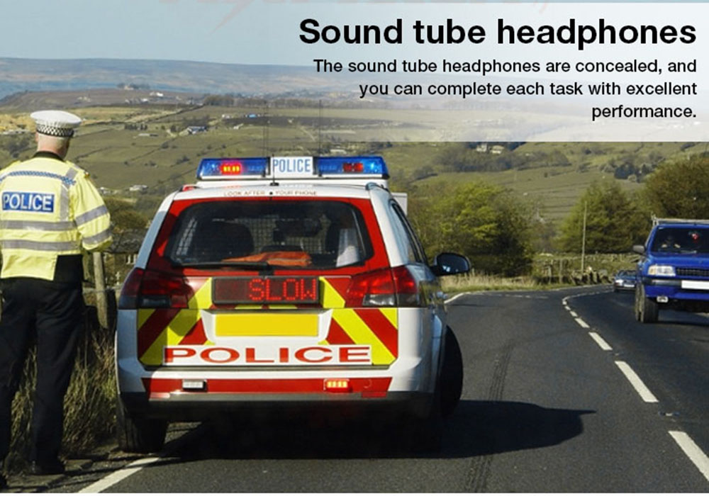 Highway patrol officer wearing an acoustic tube earpiece while on duty